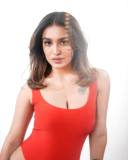 saniya-iyappan-latest-photos-in-Red-Body-Suit-002