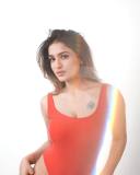 saniya-iyappan-latest-photos-in-Red-Body-Suit