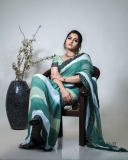 Sanusha-Santhosh-photoshoot-in-multi-shaded-dyed-saree-003