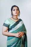 Sanusha-Santhosh-photoshoot-in-multi-shaded-dyed-saree-008