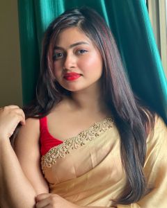 shaalin-zoya-in-golden-saree-with-red-sleeveless-wide-neck-photos-002