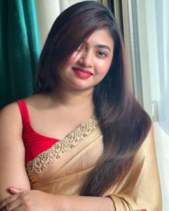 shaalin-zoya-in-golden-saree-with-red-sleeveless-wide-neck-photos-003