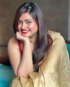 shaalin-zoya-in-golden-saree-with-red-sleeveless-wide-neck-photos