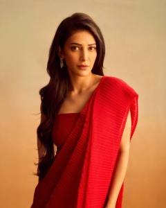 shruti-haasan-in-Crimson-Red-Western-Fusion-Saree-paired-with-a-structured-cut-out-embroidered-cropped-lace-cape-or-jacket-001