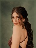 shruti-haasan-in-Deep-Rust-Copper-Sequined-Ball-Gown-floor-sweeping-flared-skirt-bodice-supported-by-thin-spaghetti-straps-style-photos