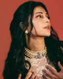 shruti-haasan-in-Sheer-White-Lace-Top-with-Lace-Up-Black-Trousers-photos-002