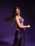 shruti-haasan-in-two-piece-modern-Indo-western-couture-ensemble-featuring-an-ornate-corset-bustier-paired-with-a-draped-skirt-dress-photos-001