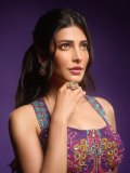 shruti-haasan-in-two-piece-modern-Indo-western-couture-ensemble-featuring-an-ornate-corset-bustier-paired-with-a-draped-skirt-dress-photos
