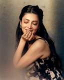 shruti-haasan-in-vintage-inspired-romantic-a-line-Floral-Print-Corset-midi-dress-featuring-a-bustier-bodice-style-photos-005