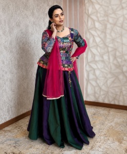 shweta-menon-in-multi-colored-geometric-and-brocade-style-jacket-style-peplum-top-with-dual-tone-color-flared-lehenga-with-heavy-vertical-pleating-004