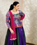 shweta-menon-in-multi-colored-geometric-and-brocade-style-jacket-style-peplum-top-with-dual-tone-color-flared-lehenga-with-heavy-vertical-pleating-001