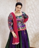 shweta-menon-in-multi-colored-geometric-and-brocade-style-jacket-style-peplum-top-with-dual-tone-color-flared-lehenga-with-heavy-vertical-pleating