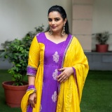 swetha-menon-in-violet-and-yellow-combination-churidar-photos-001