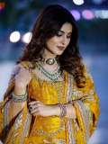 sneha-in-traditional-Indian-lehenga-choli-set-featuring-a-sleeveless-blouse-design-photos-001
