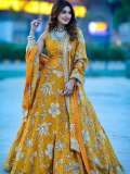 sneha-in-traditional-Indian-lehenga-choli-set-featuring-a-sleeveless-blouse-design-photos-006