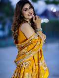 sneha-in-traditional-Indian-lehenga-choli-set-featuring-a-sleeveless-blouse-design-photos