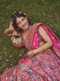 sreeleela-in-Bright-Pink-heavily-Embellished-Mirror-Work-Lehenga-photos-002