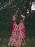 sreeleela-in-Bright-Pink-heavily-Embellished-Mirror-Work-Lehenga-photos-003