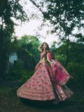 sreeleela-in-Bright-Pink-heavily-Embellished-Mirror-Work-Lehenga-photos-006