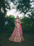 sreeleela-in-Bright-Pink-heavily-Embellished-Mirror-Work-Lehenga-photos-007