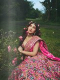 sreeleela-in-Bright-Pink-heavily-Embellished-Mirror-Work-Lehenga-photos