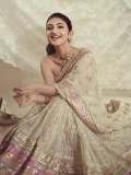 sreeleela-in-Ivory-colour-saree-with-multicolour-border-and-tube-style-matching-embroidered-blouse-pics-006