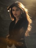 sreeleela-in-luxurious-black-velvet-jacket-featuring-a-sharp-V-neckline-Cinctured-at-the-waist-with-a-statement-geometric-belt-photos-003