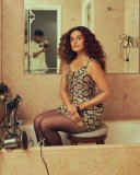 taapsee-pannu-in-bodycon-short-dress-with-curly-hair-style-photos-011