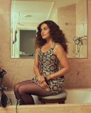 taapsee-pannu-in-bodycon-short-dress-with-curly-hair-style-photos-013