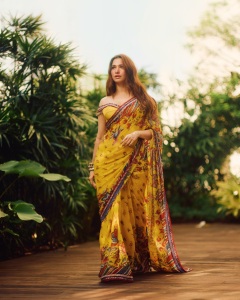 tamanna-in-yellow-saree-with-red-border-vvaan-launch-look-photo