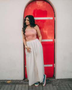 veena-nandakumar-in-palazzo-pants-and-crop-top-photos-001