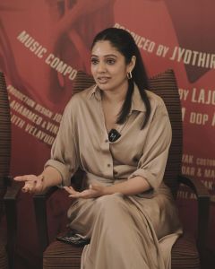 veena-nandakumar-in-satin-shirt-with-knotting-skirt-dress-photos-005