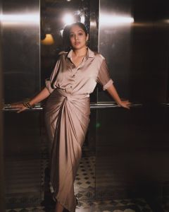 veena-nandakumar-in-satin-shirt-with-knotting-skirt-dress-photos