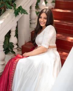 veena-nandakumar-in-white-lehenga-with-combination-dupatta-dress-photos-003