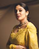 veena-nandakumar-in-yellow-saree-with-designer-blouse-photos-004