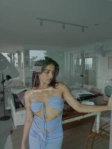 wamiqa-gabbi-in-light-blue-swimsuit-dress-photos-003