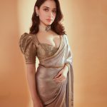 tamanna in saree with gold brocade border