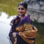 meera nandan in violet and check kanchipuram saree photos