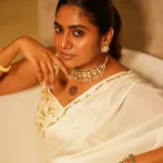 nimisha sajayan in white saree with ornaments and makeup ideas photos
