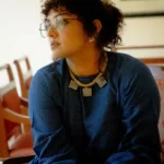 parvathy thiruvothu in green long dress photos 002