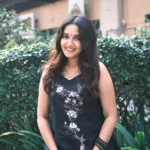 anikha surendran in black dress with flower design images