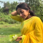 rajisha vijayan new latest photos in yellow saree after weight loss 004