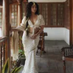 rima kallingal new glamour look photos