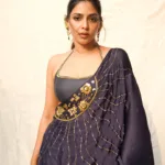 aishwarya lekshmi in Draped in the navy blue ethereal Taarakan Saree and halter neck blouse with tie up photos 003