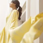 aishwarya lekshmi in yellow beautiful saree and ornaments photos
