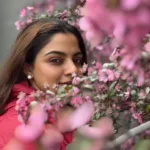 nikhila vimal latest photos in the middle of flowers 001