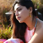 aishwarya lekshmi in multicolor sleeveless long top dress photos