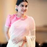 anaswara rajan in rani pink blouse with off white saree style ideas photos-005