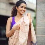 anupama parameswaran in violet blouse with cotton saree photos 004