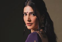 shruti haasan in Royal Deep Purple with Gold Accents Satin Silk saree paired with a matching low back embellished blouse photos